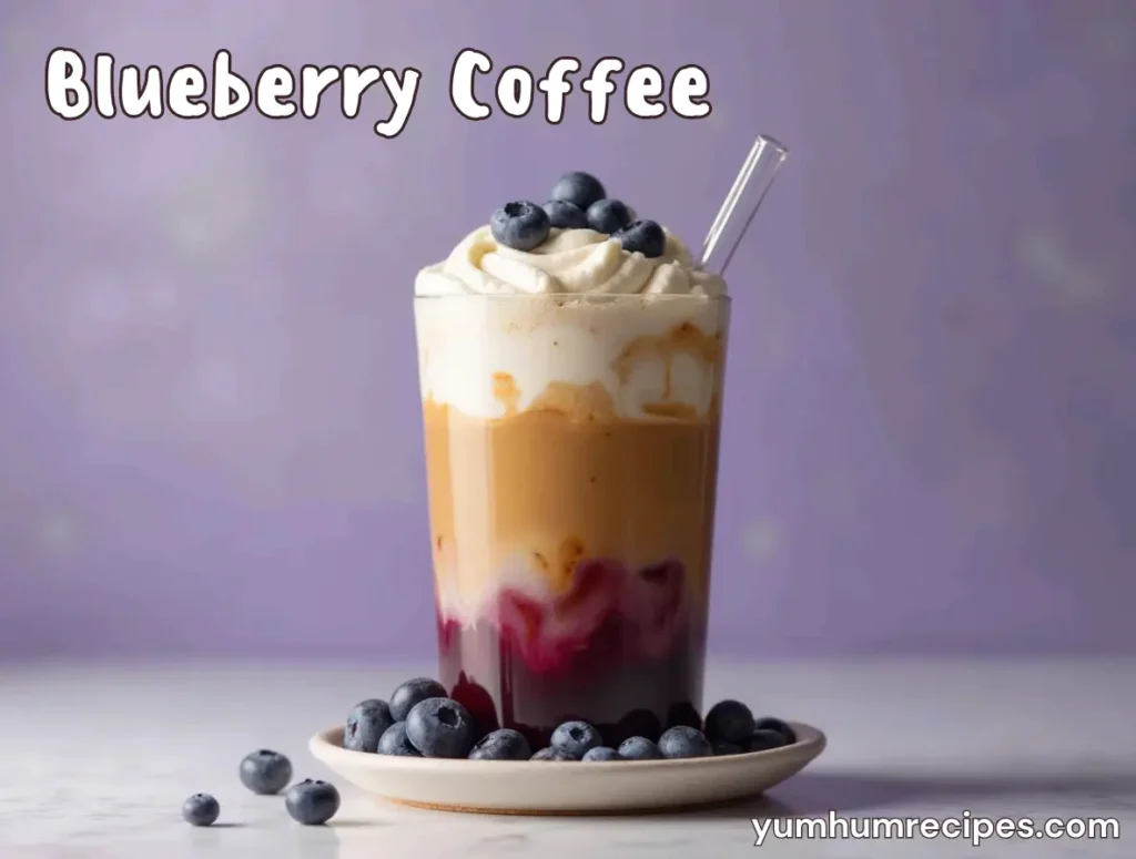 A cup of blueberry coffee with fresh blueberries and coffee beans on a wooden table in a cozy café.